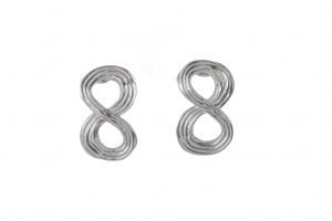 Aretes Infinito en Plata. Inspirados en la física cuántica y la energía eterna. Joya de autor para un estilo sin límites.